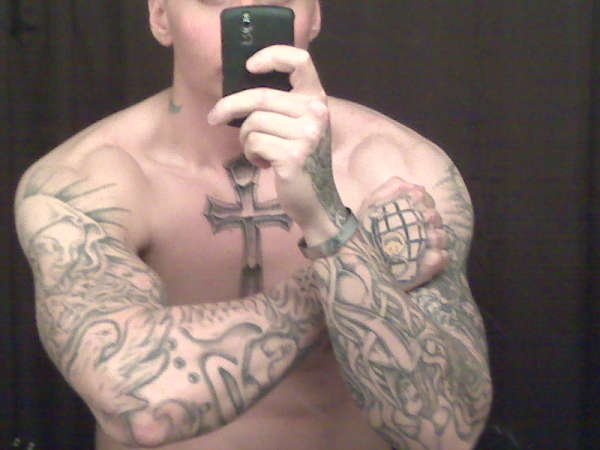 chest and arms tattoo