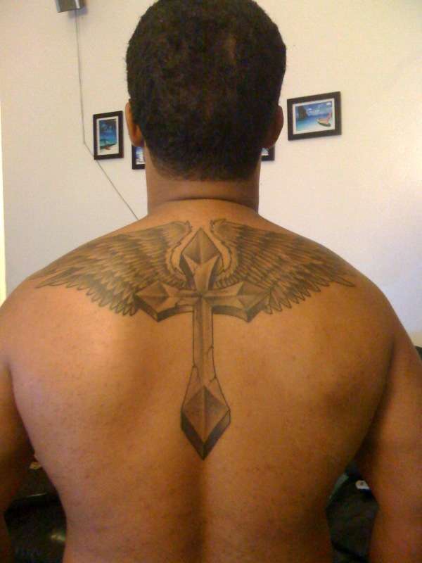 winged cross tattoo
