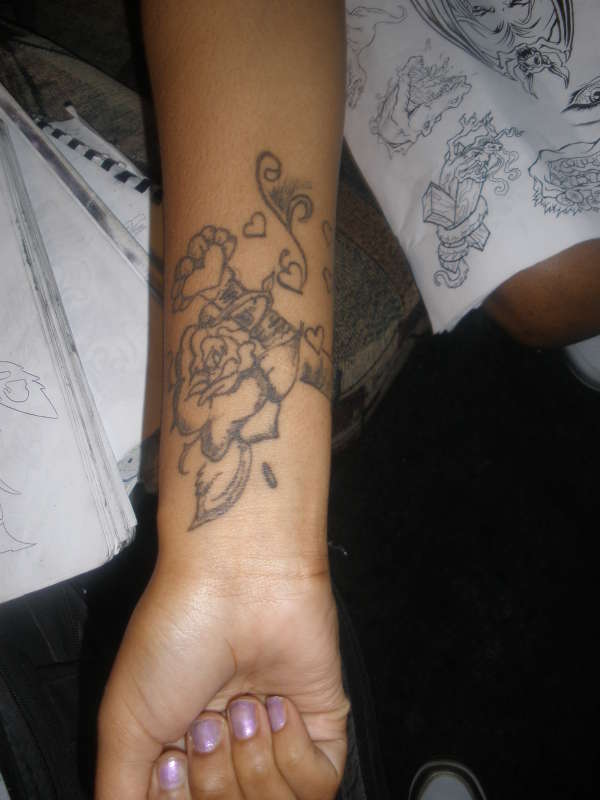a key with hearts tattoo