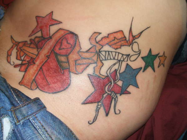 dagger goin thru heart tattoo