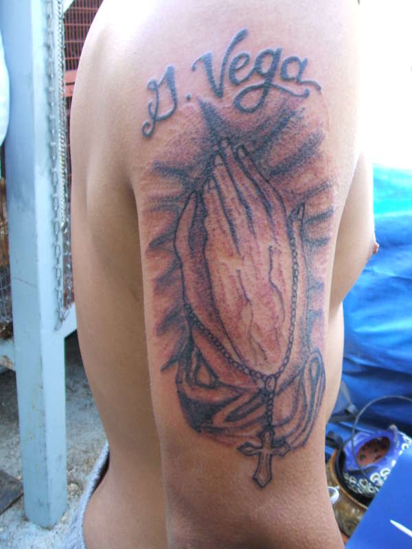 praying hands tattoo