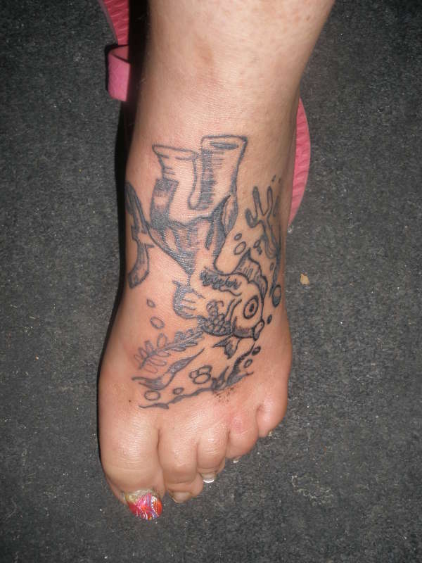underworl with pisces smbol tattoo