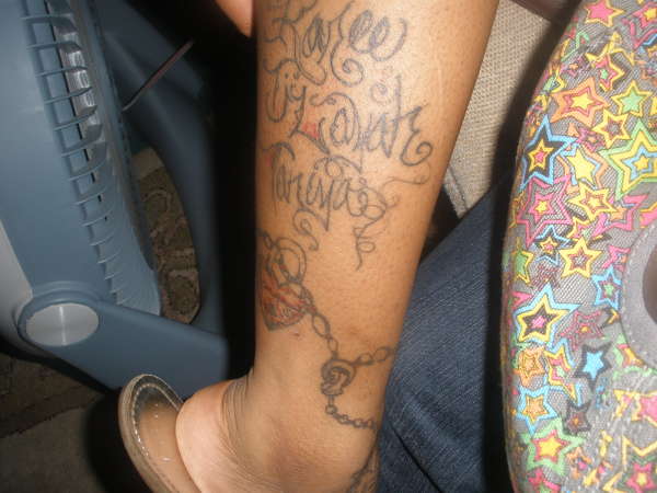 ANKLET WITH KIDS NAMES N LOCKETS tattoo