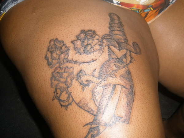 HEART WITH KNIFE tattoo