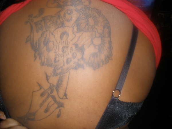 KNIFE WITH FLOWERS tattoo