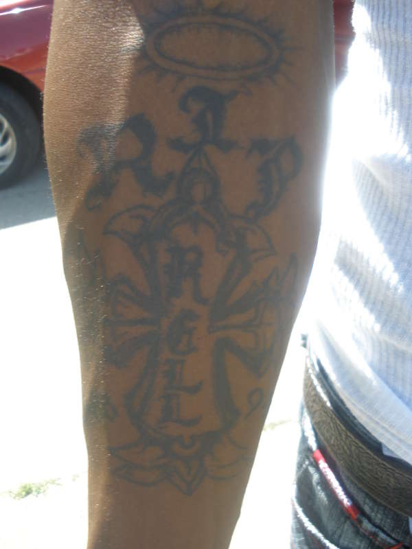 RIP FOR COUSIN tattoo