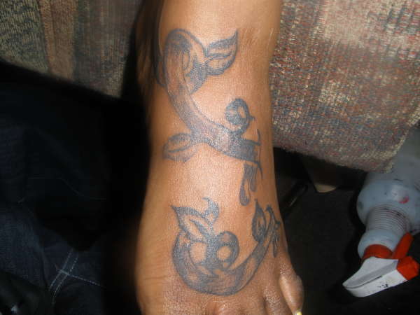 VINES RIPPIN THROUGH FEET tattoo