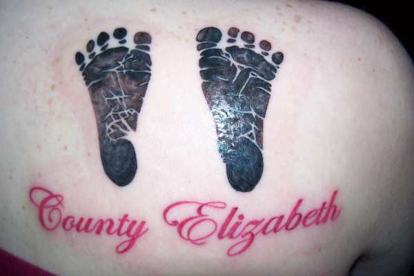 My daughters footprints tattoo