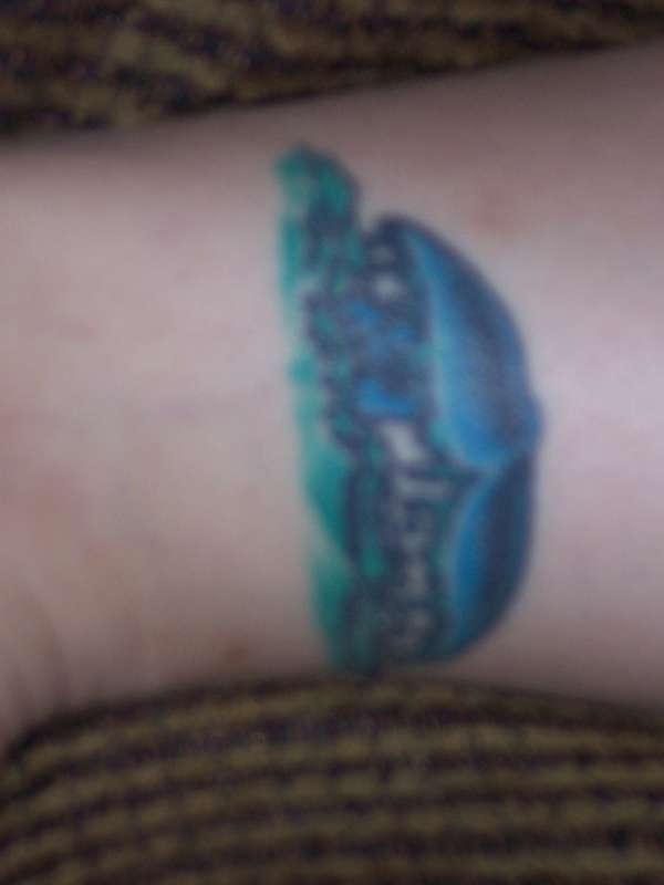 My wifes whale - ankle tattoo