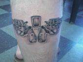 Revolvers and whiskey tattoo