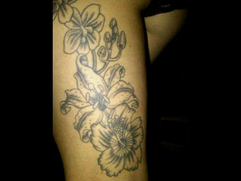 thigh flower bunch tattoo