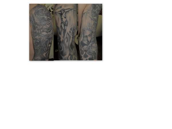 black and grey arm sleeve tattoo