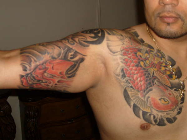 koi fish and japanese demon hungs tatto parlor tattoo
