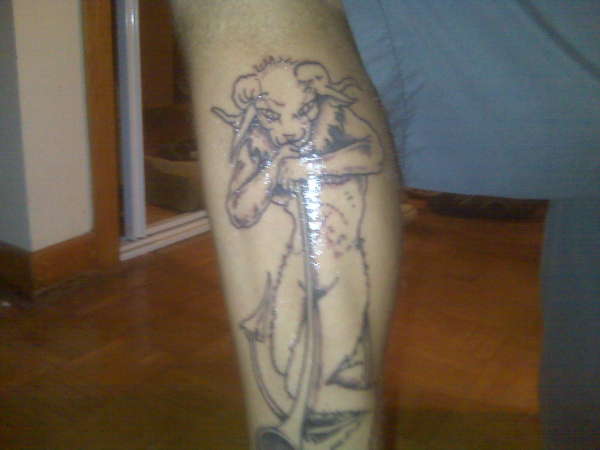 Horne god Pan tattoo
