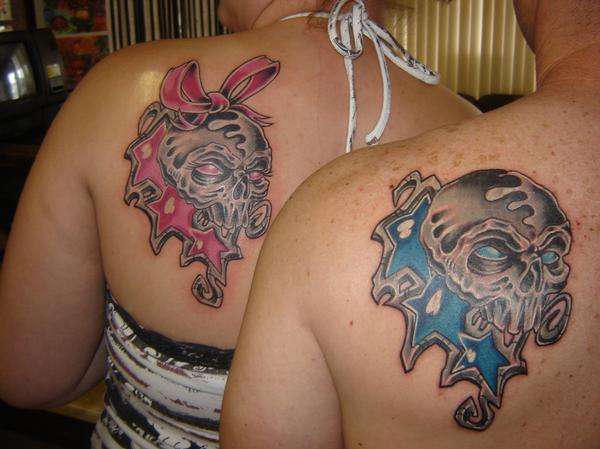 matching skulls tattoo
