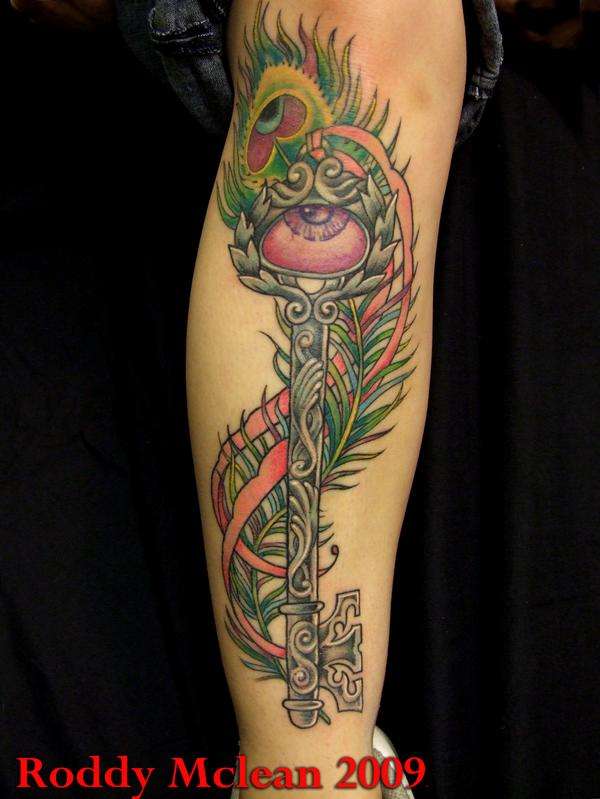 peacock key tattoo