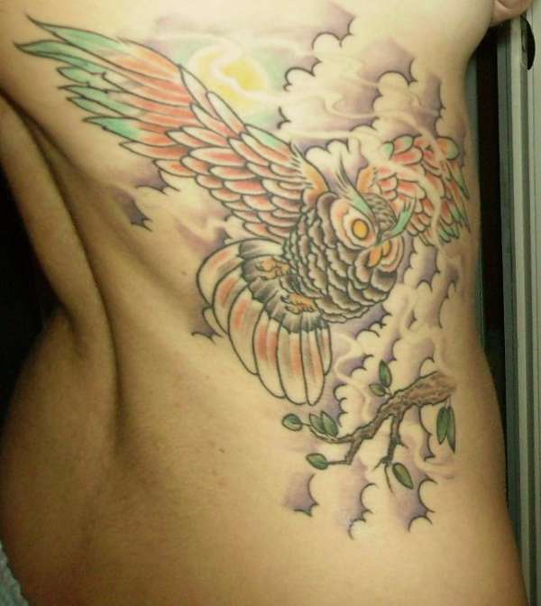 Another view of the owl tattoo