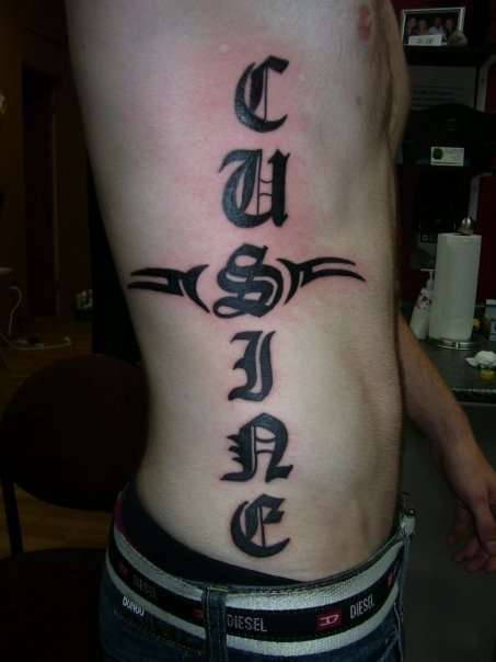 last-name-right-rib-tattoo