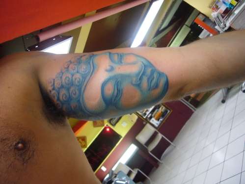 Blue Buddha Head tattoo