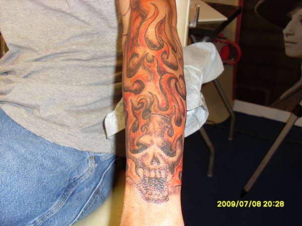 skull and flames tattoo