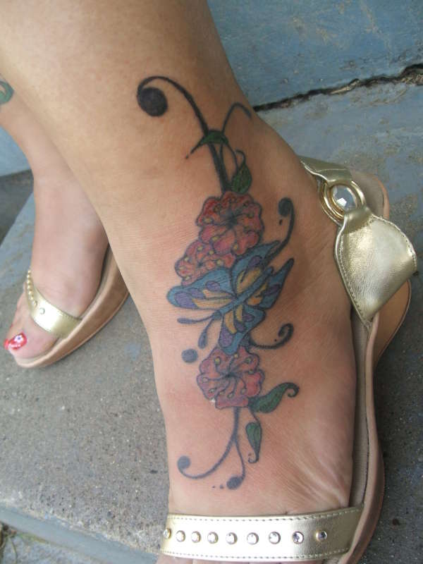 butterfly with flowers tattoo