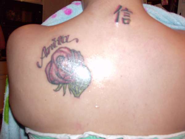 rose with name tattoo