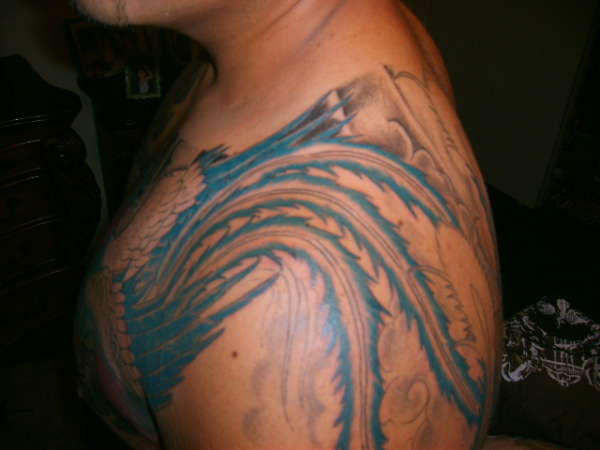 SHOULDER PHOENIX TALE WORK IN PROGRESS tattoo