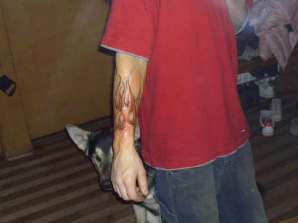 Arm band of flames tattoo