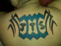 Aquarius/Gemini tribal with initials tattoo