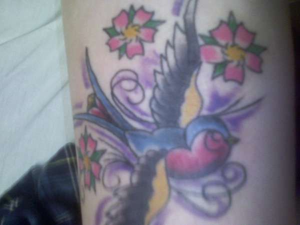 Sparrow and cherry blossoms tattoo