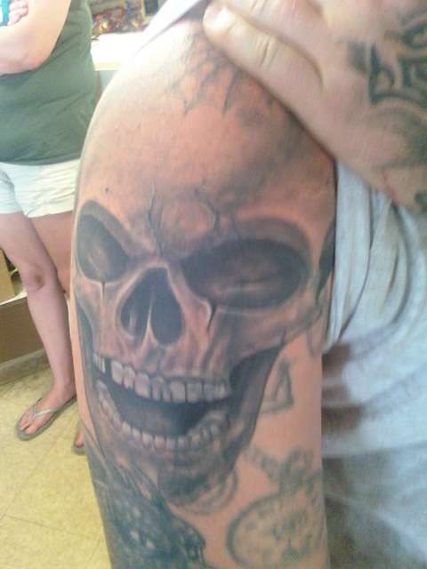 gully with a skully tattoo