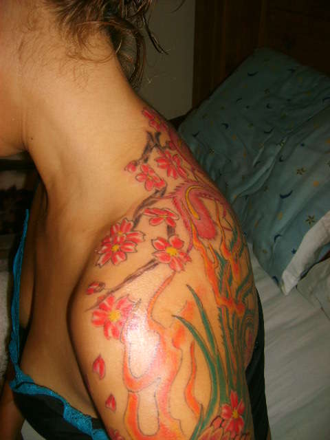 shoulder phoenix tale and cherry blossoms tattoo