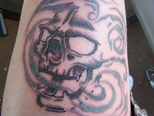 smoke and skull tattoo