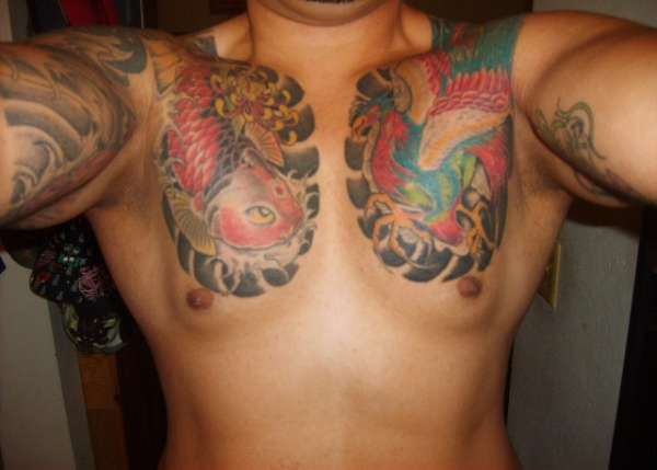 finallly done with the chest my left arm its next tattoo