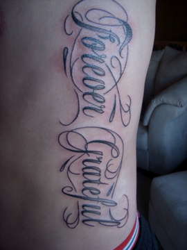 rib Tattoo (left side) tattoo