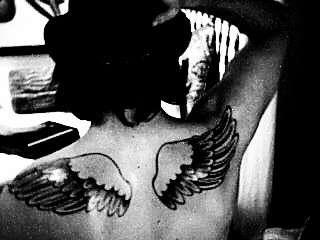 the wings ! tattoo