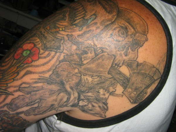 Shoulder of left Arm Sleeve tattoo