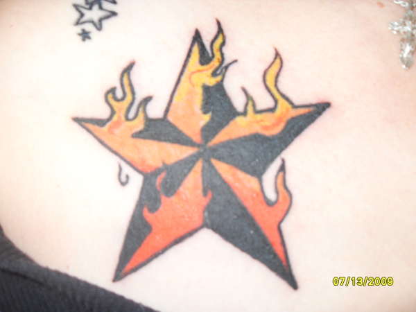 star on my chest tattoo