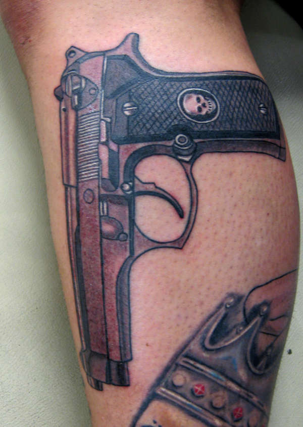 Gun tattoo