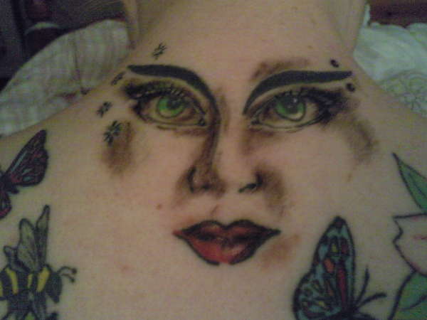 modified face, on my back tattoo