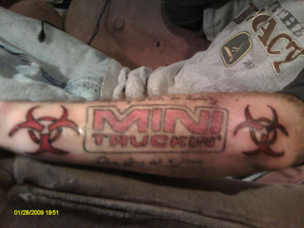 Left arm tattoo