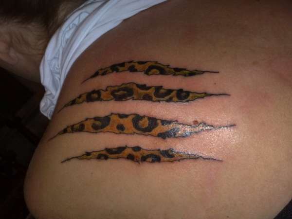 leopard print scratches tattoo
