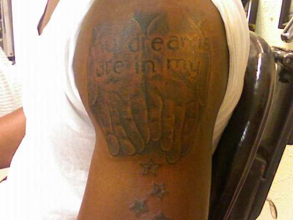 "my dreams are in my"---->hands tattoo