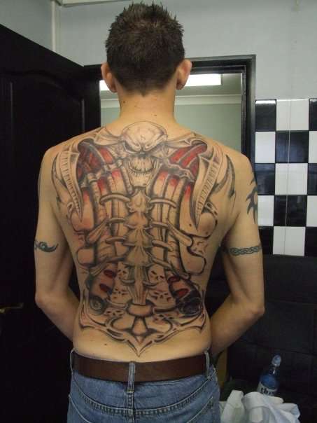 skull backpiece tattoo