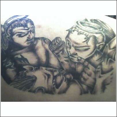 Angels Fighting a Demon tattoo