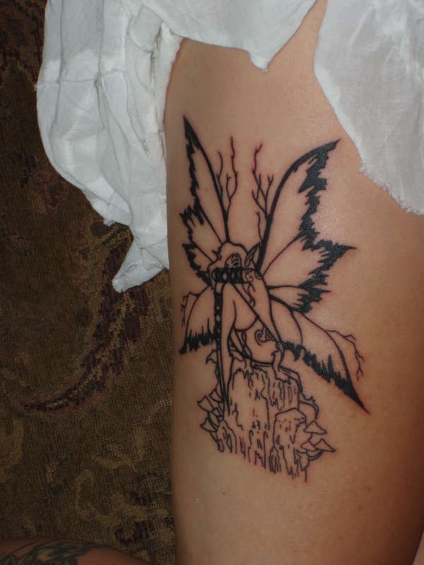Wifes fairy outline tattoo