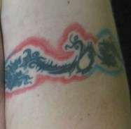 Finished tribal dragon tattoo