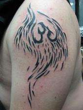 tribal phoenix by: Chi-Roc tattoo