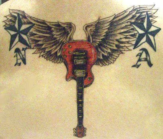 Winged Les Paul tattoo