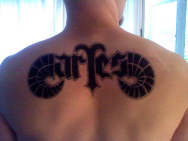 Aries tattoo on back